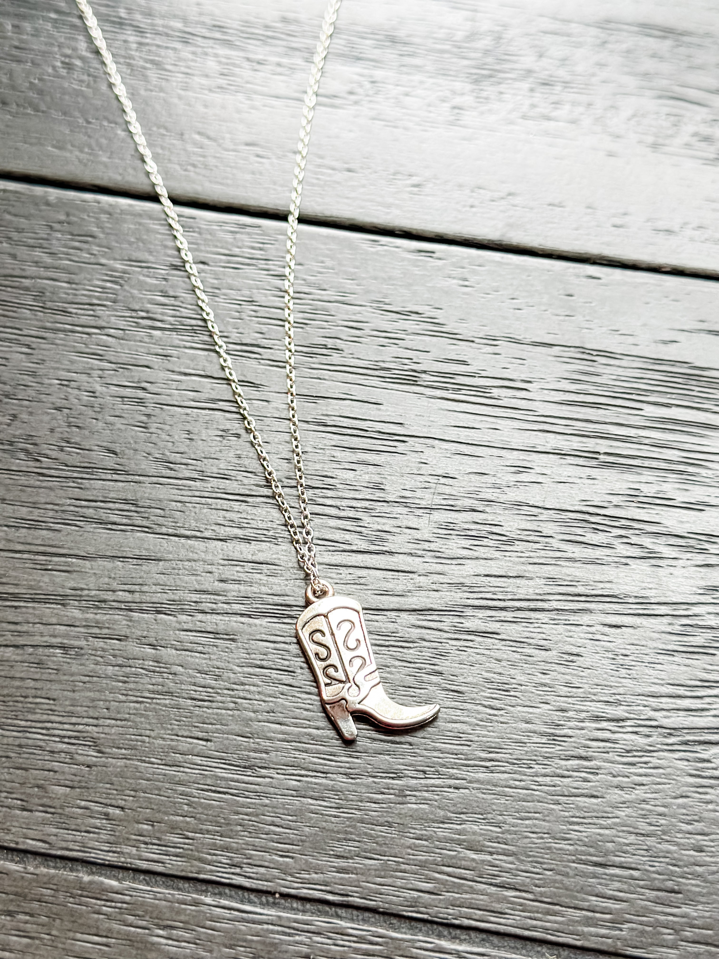 Silver cowboy boot necklace